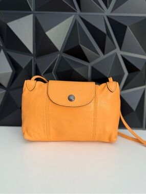 Longchamp Le Pliage Cuir Small Crossbody Bag in Orange